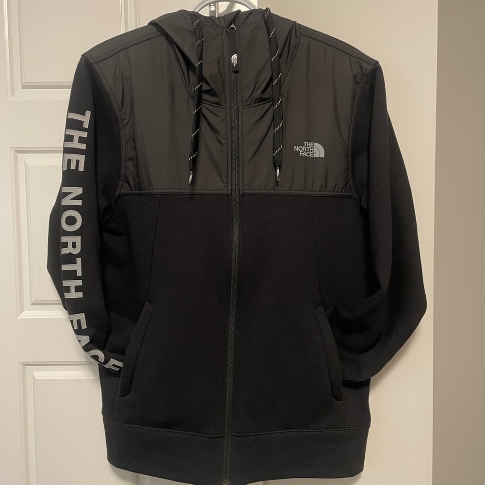 The North Face Black Performance Jacket with Weather-Resistant Material